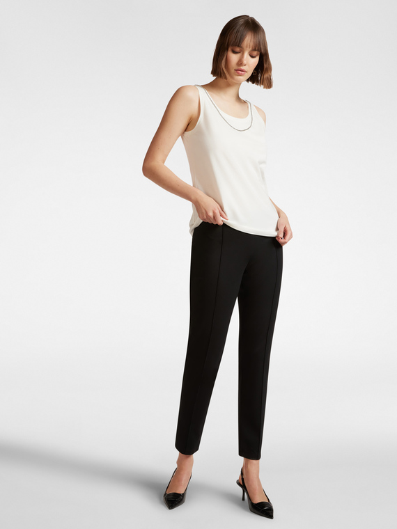 Pantaloni slim fit in punto Milano