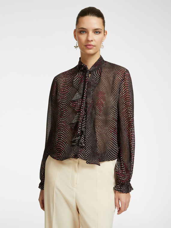 Blusa stampata con volant e fiocco