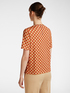 T-shirt stampata con collana image number 1