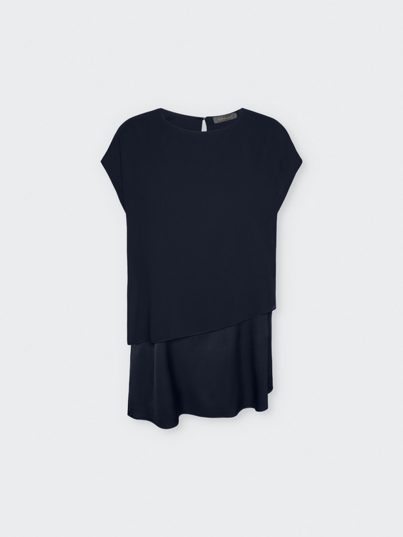Blusa con sovrapposizione