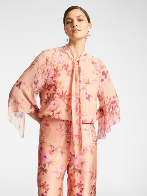 Blusa elegante floreale
