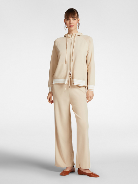 Pantaloni in maglia con bordi a righe
