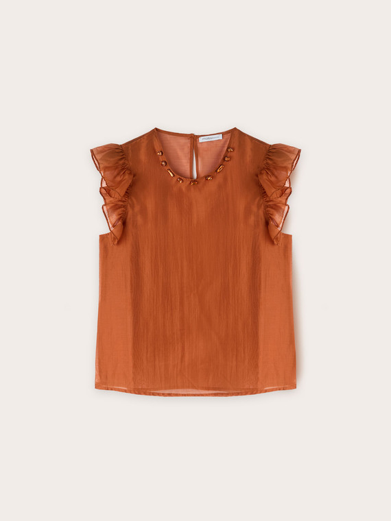 Light blouse with stones