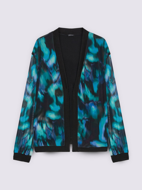 Unstructured jacket in patterned tulle