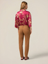 Chino pants with decorative chain image number 1