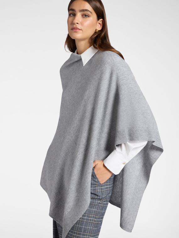Asymmetrical wool cape