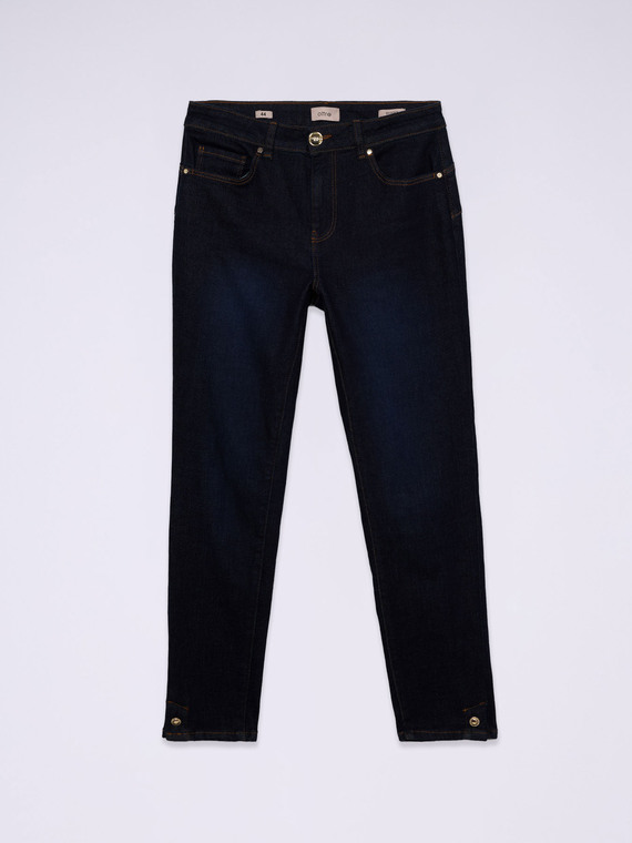 Rinse blue skinny jeans with buttons at the bottom of the leg