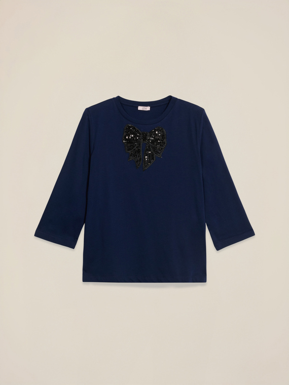 T-shirt con patch in paillettes