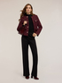 Pantaloni flare con motivo occhielli image number 0