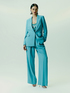 Pantaloni palazzo satin con piping laterale image number 0