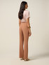 Flare pants with decorative chain image number 1