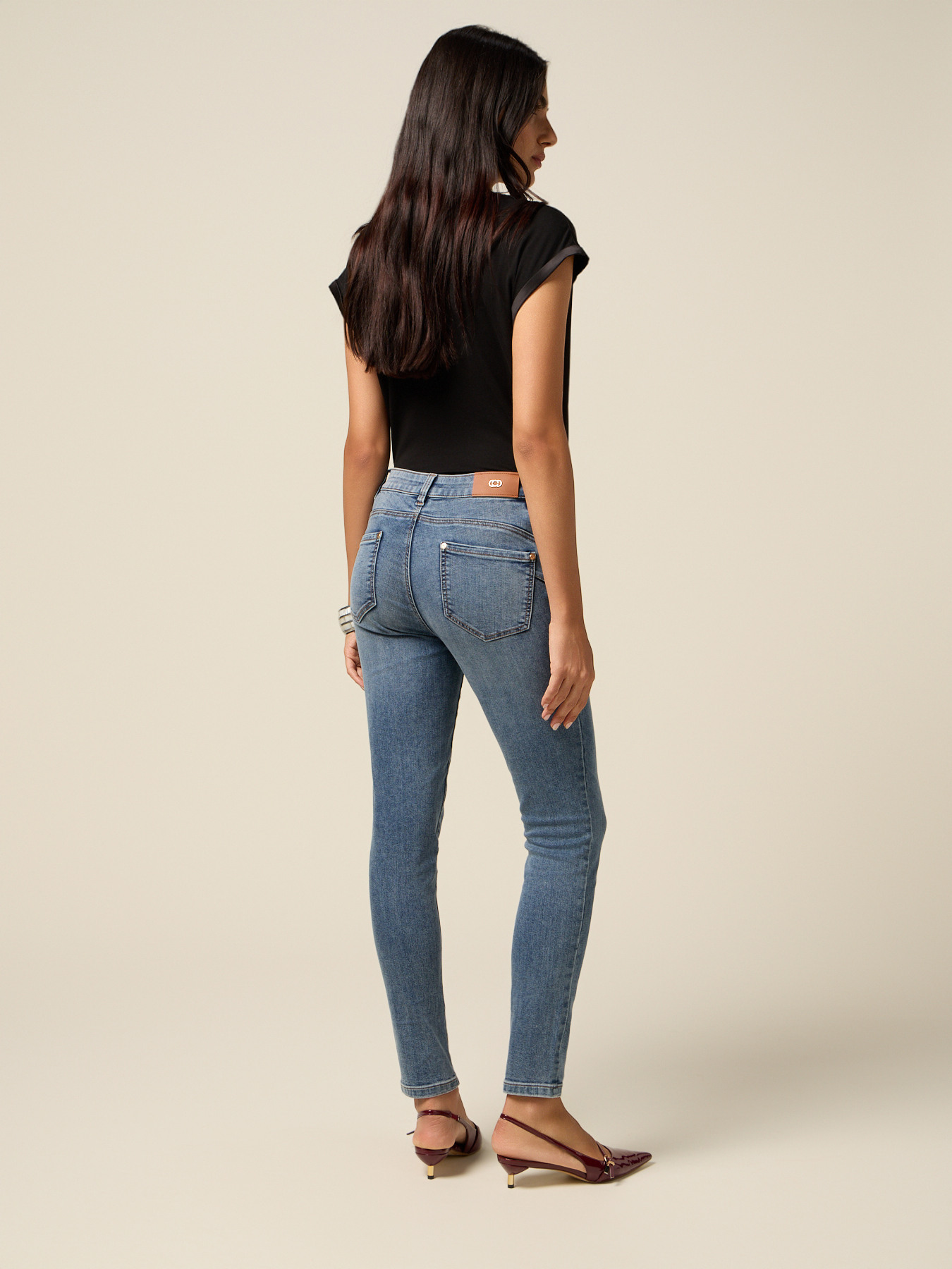 Stone-washed skinny jeans image number 1