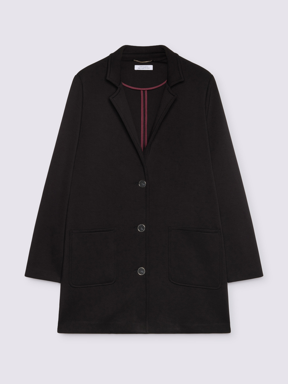 Cappotto in scuba dalla linea essenziale