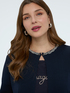 Cardigan in maglia fine con collana applicata image number 0
