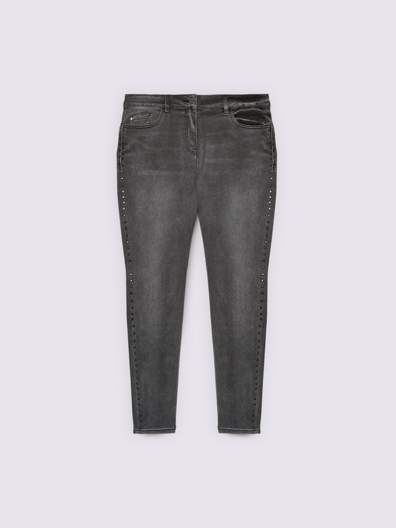 Jeans skinny con borchie