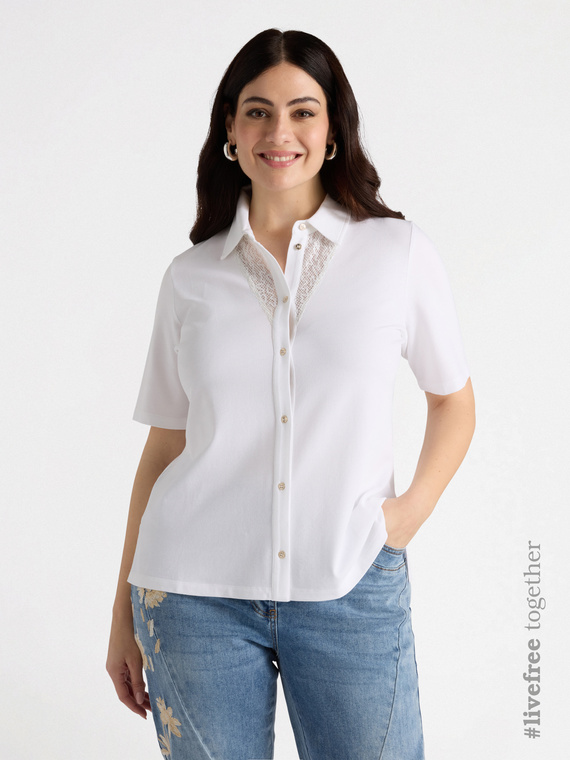 Shirt with embroidered inserts