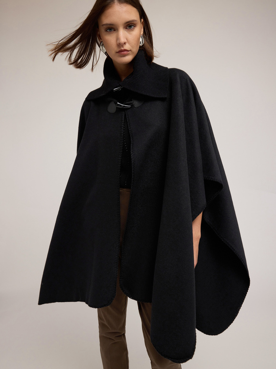 Wool poncho with high collar