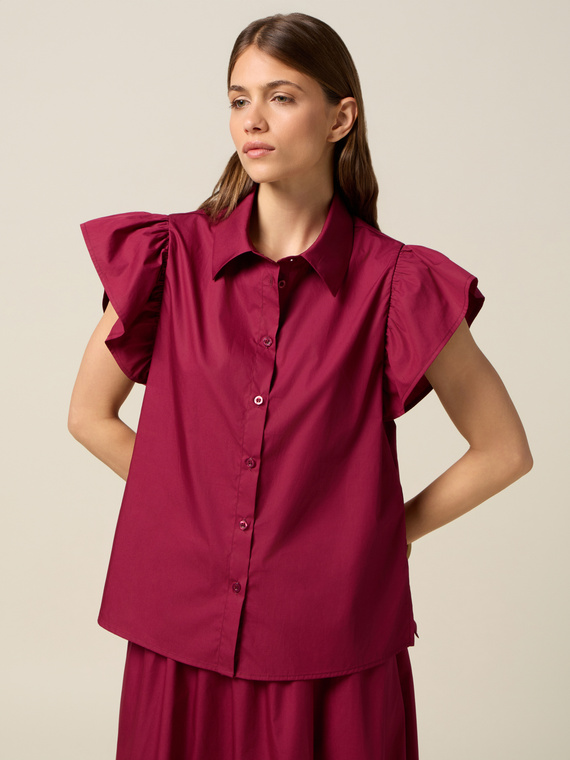 Short-sleeved shirt with flap sleeves