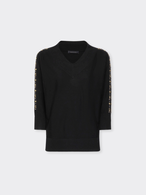 Maglia con borchie sulle maniche