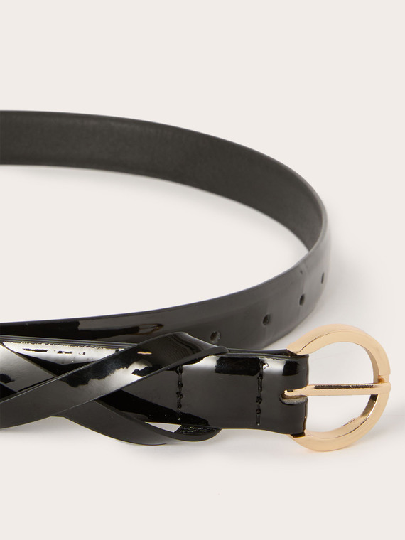 Patent leather belt with crossover keeper loop