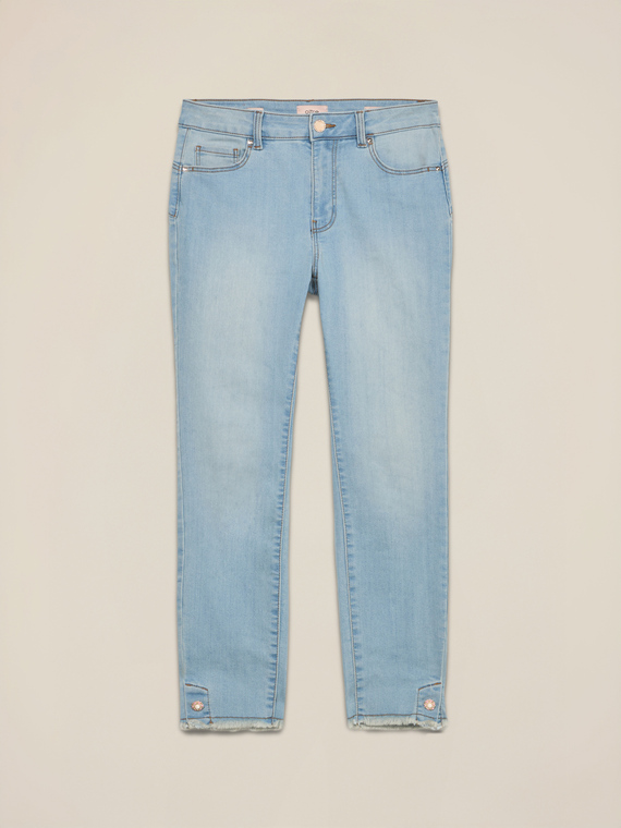 Skinny jeans with stone bleached effect and button details