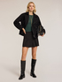 Pleated short skirt image number 0