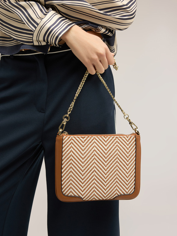 Flat clutch with two-tone weave