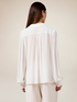 Blusa in tessuto crêpe con catena image number 1
