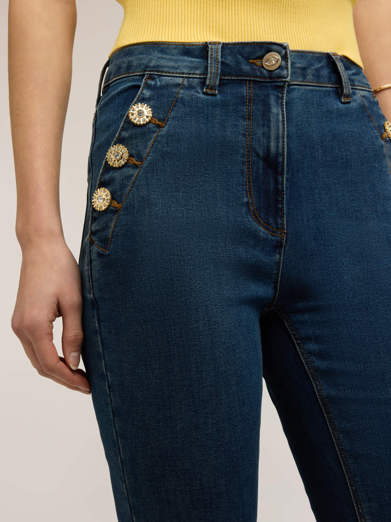 Flare jeans with jewel buttons image number 2