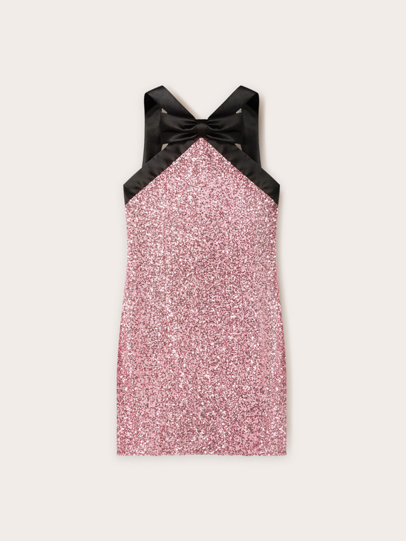 Mini-jupe entièrement en paillettes avec nœud