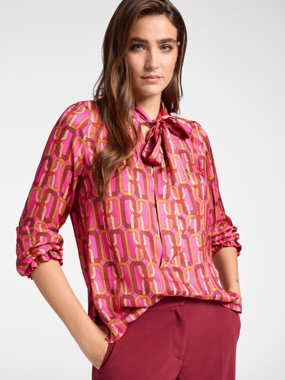 Blusa stampata con fusciacca