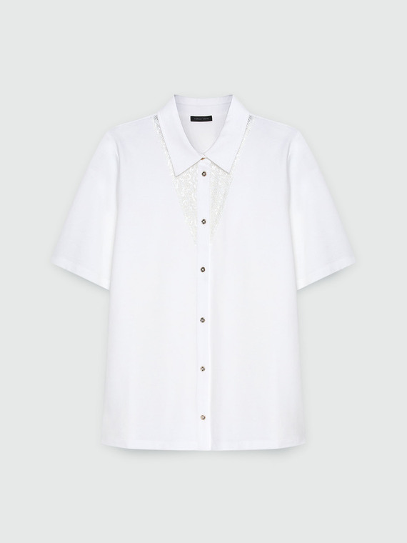 Shirt with embroidered inserts
