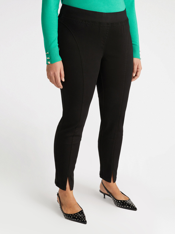 Jeggings con spacchi al fondo