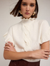 Pull oversize avec tresse et volant image number 3