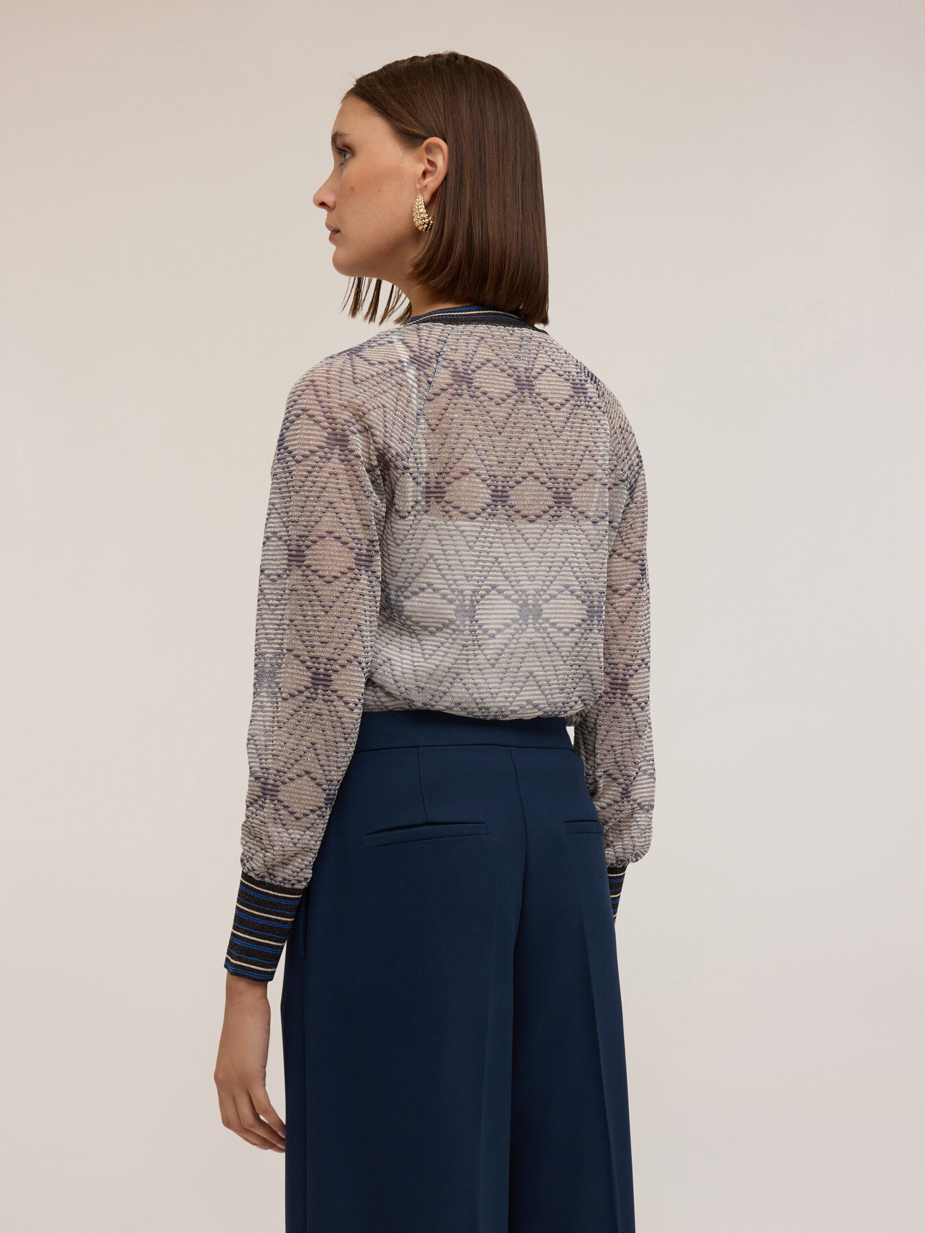 Maglia fantasia geometrica con top image number 1