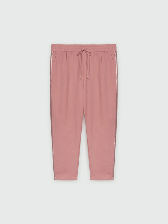 Pantaloni con bordi ricamati