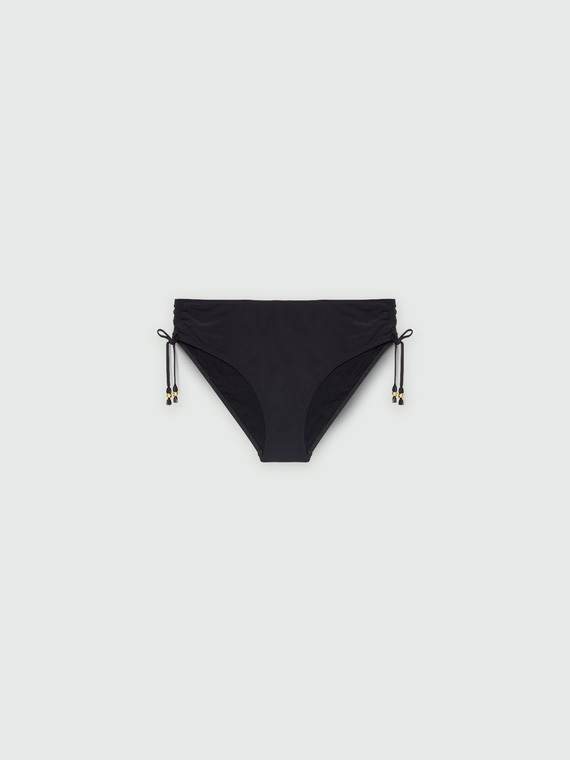 Slip con coulisse laterale