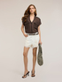 Camisa en georgette laminada con bolsillos image number 2