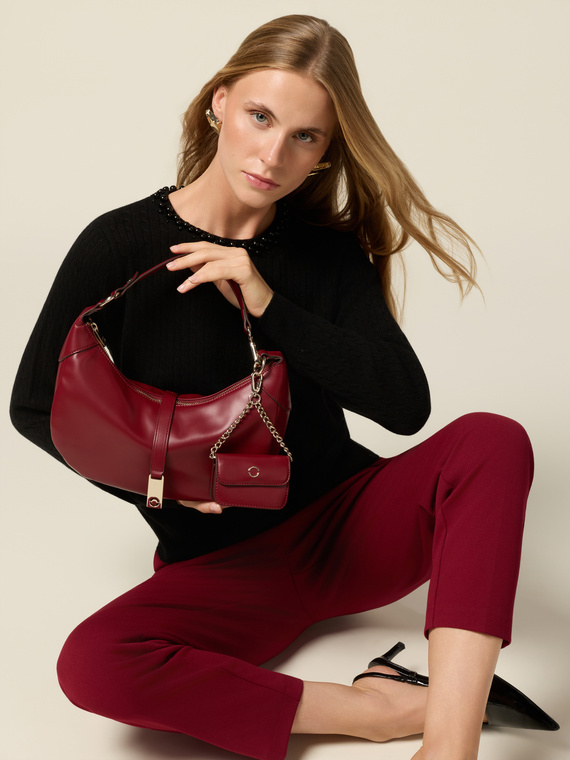 Tracolla con zip e ciondolo metallico