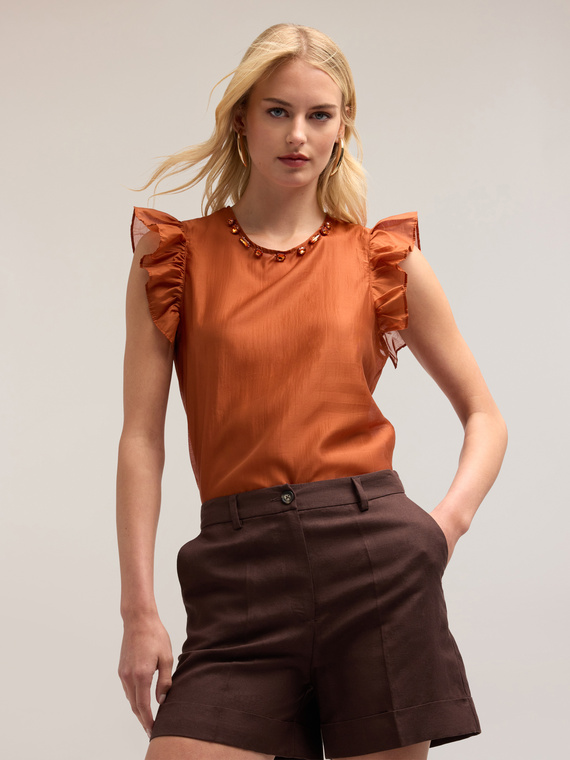 Light blouse with stones