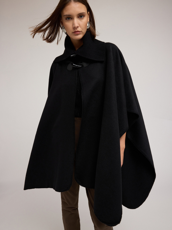 Wool poncho with high collar