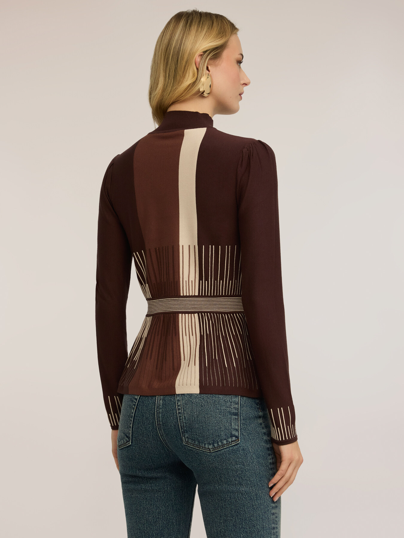 Striped turtleneck sweater with peplum cut image number 1