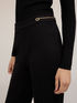 Pantaloni flare con motivo occhielli image number 3