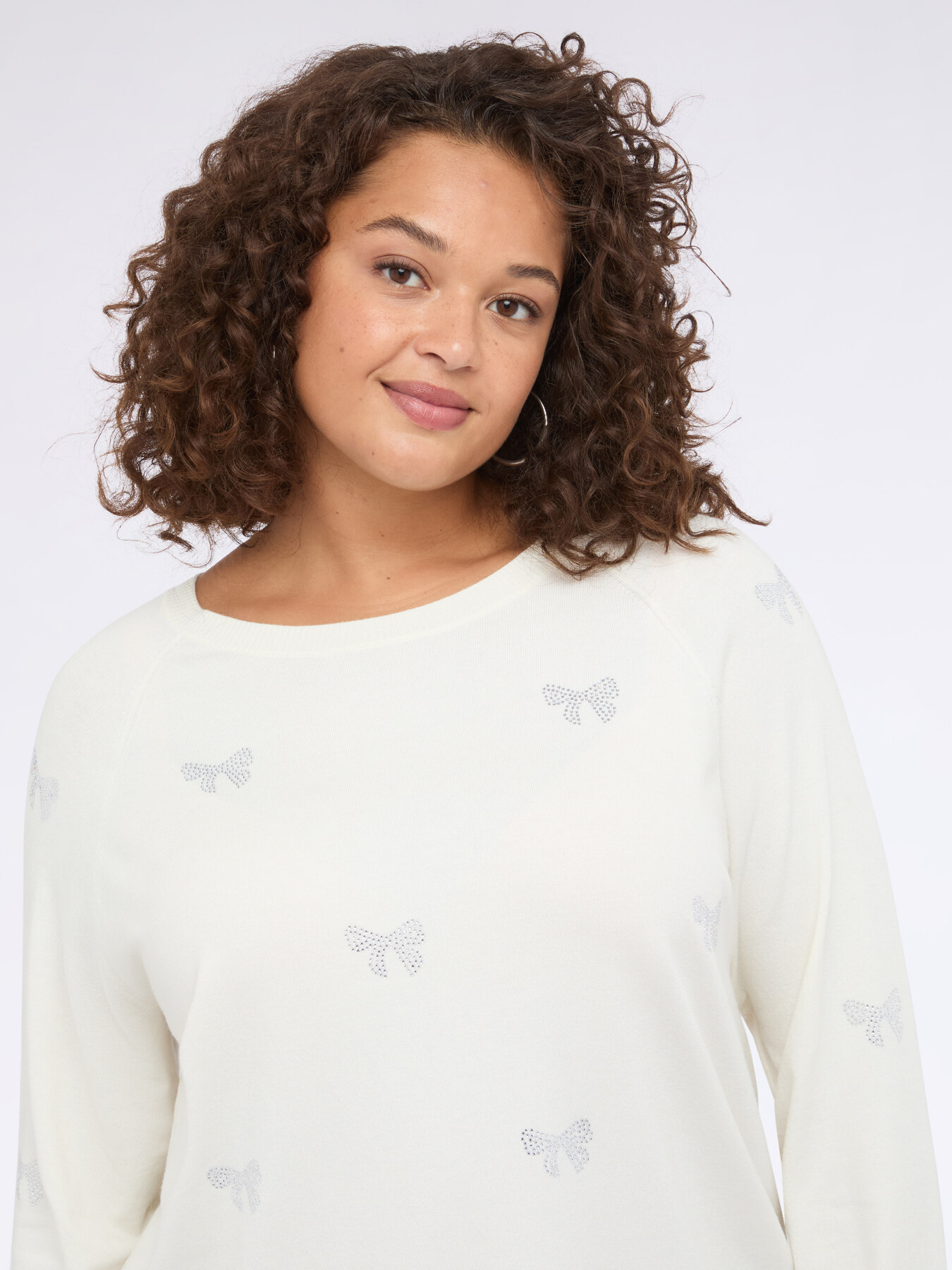 Maglia con applicazioni luminose a fiocchetti image number 3