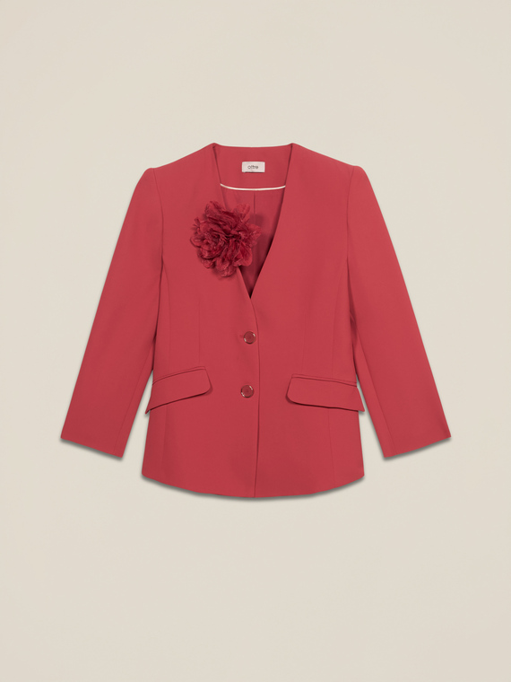 Chaqueta estructurada con flor decorativa