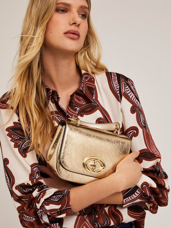 Small bag in shimmer gold fabric