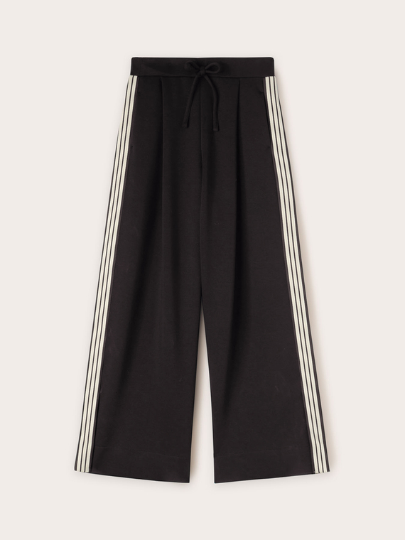 Joggers con banda laterale e spacco