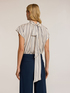 Blusa over a righe con fiocco posteriore image number 1