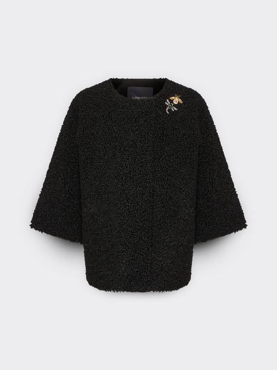 Veste en tissu peluche avec épingles