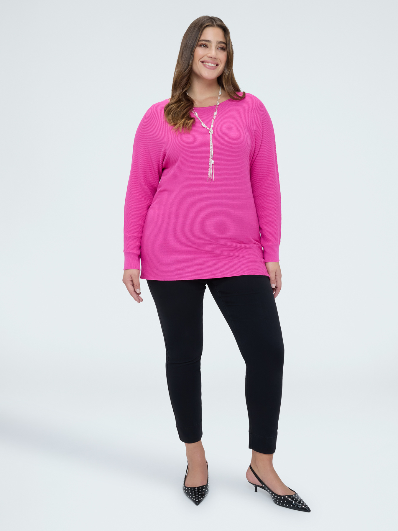 Black denim jeggings with decorative buttons image number 4